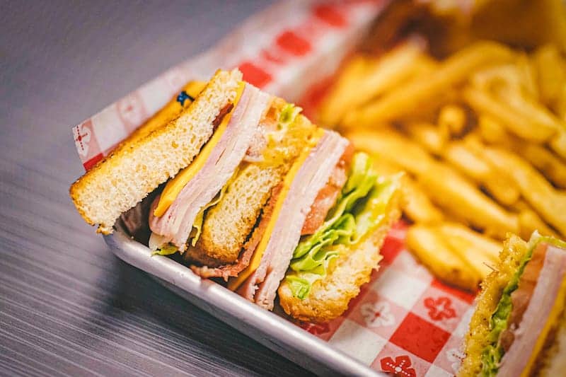 Club sandwich and fries - Picklenpins in New Orleans
