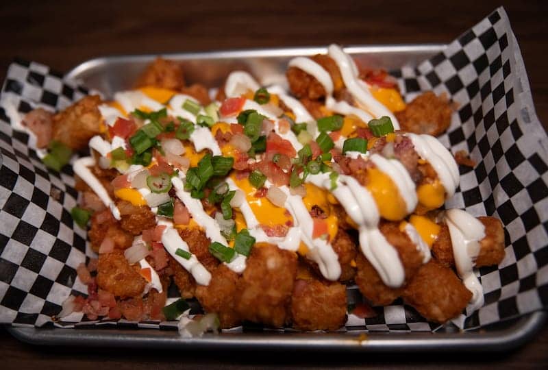 Loaded tater tots with cheese and toppings - Picklenpins in NOLA