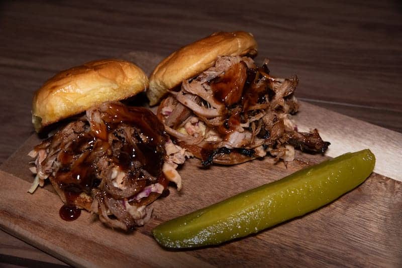 Pulled pork sandwiches with BBQ sauce and pickle - Picklenpins