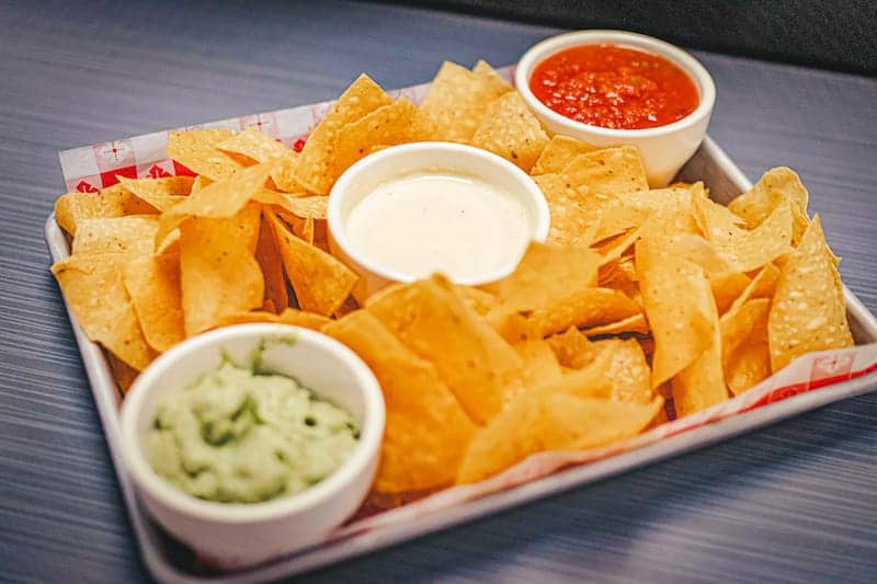 Nachos with cheese, salsa, and guacamole - Picklenpins