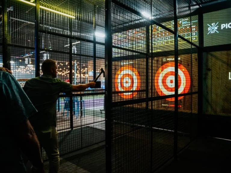 Multiple axe throwing lanes with targets at Pickle-Pins