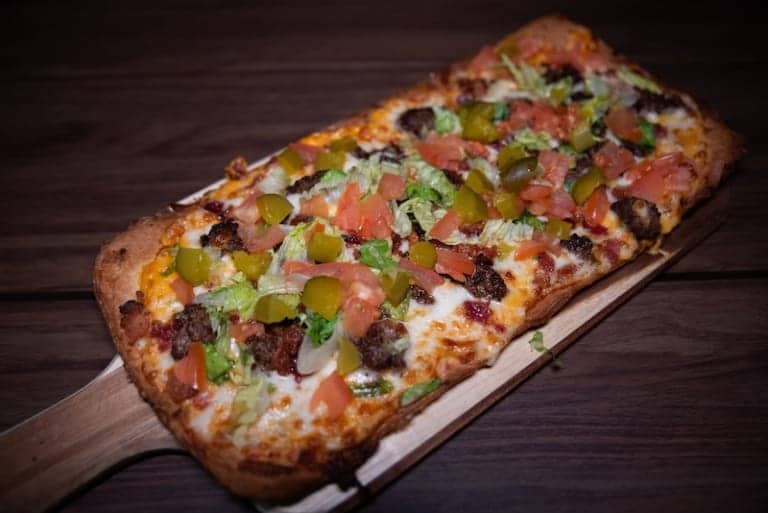 Flatbread pizza with toppings - Picklenpins in New Orleans