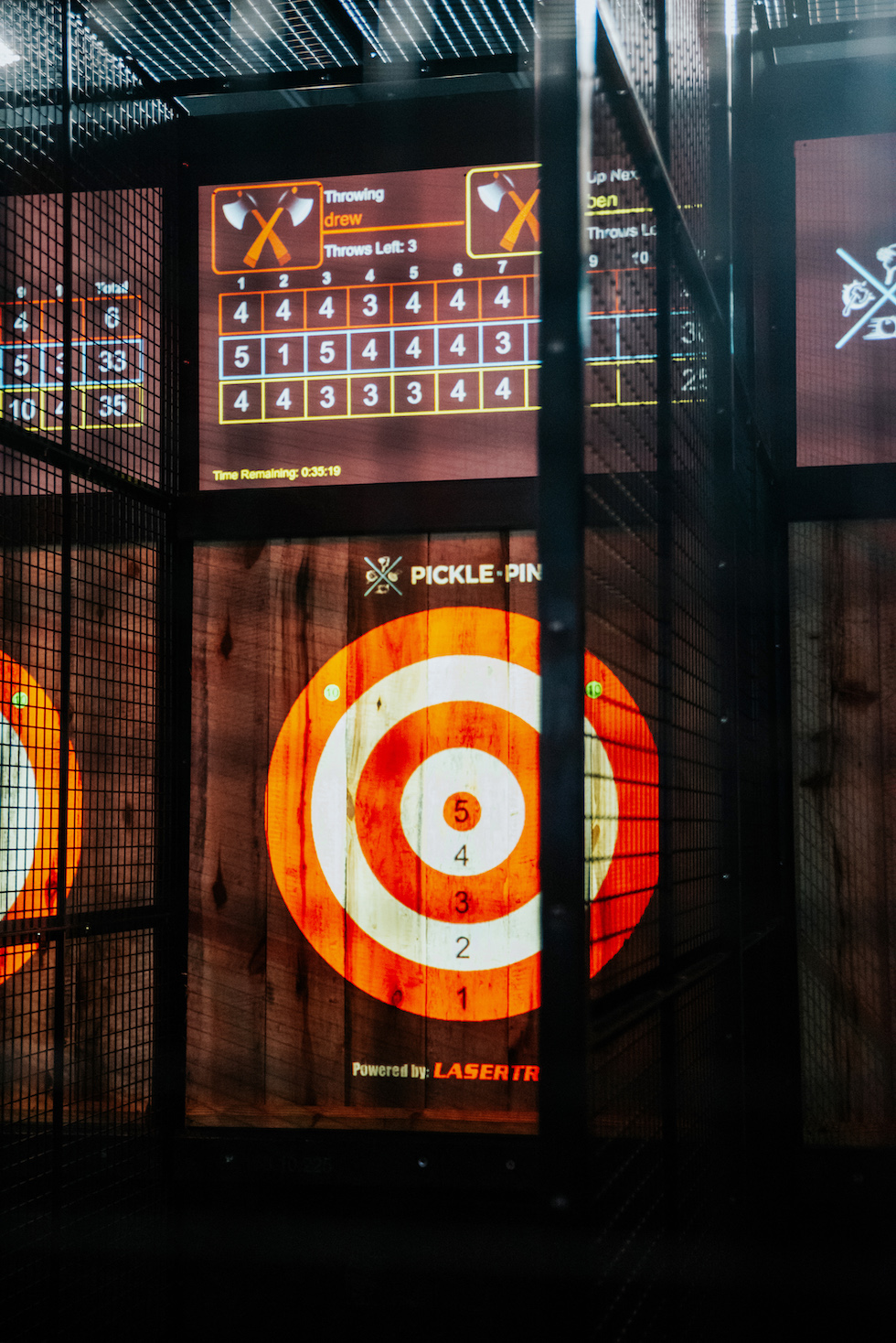 Close-up of a digital dartboard with projected graphics - Pickle-Pins